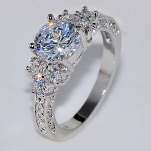 Woman's Round Stone Wedding Ring